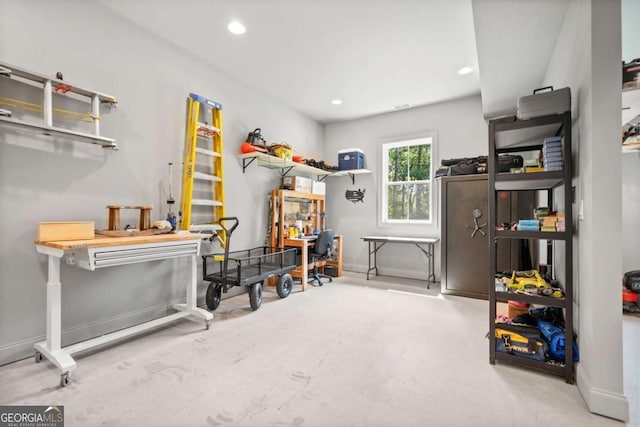 interior space featuring baseboards and recessed lighting