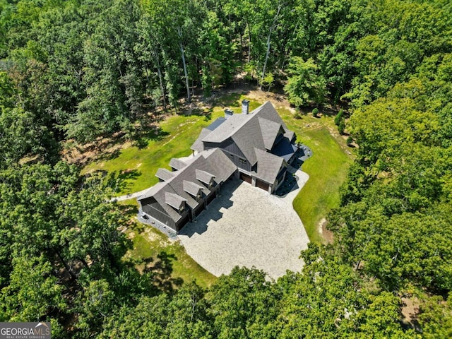 bird's eye view with a forest view