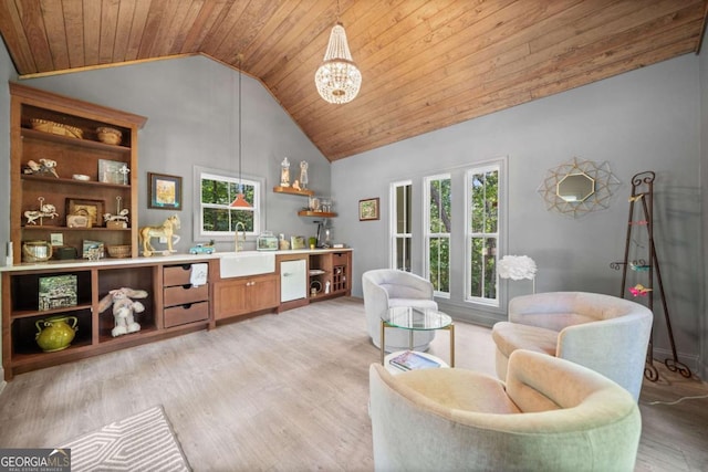 1472 Grizzle Rd, Dawsonville, GA 30534 - living room featuring wood ceiling, light wood-style floors, high vaulted ceiling, and a chandelier