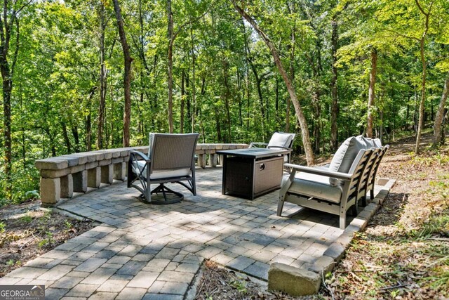 1472 Grizzle Rd, Dawsonville, GA 30534 - view of patio / terrace with a forest view
