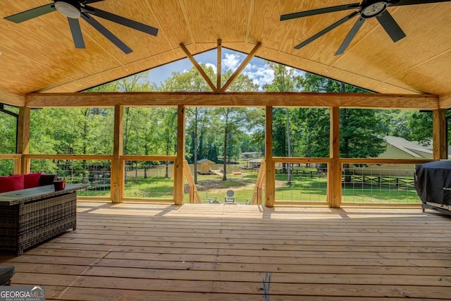 sunroom / solarium with ceiling fan