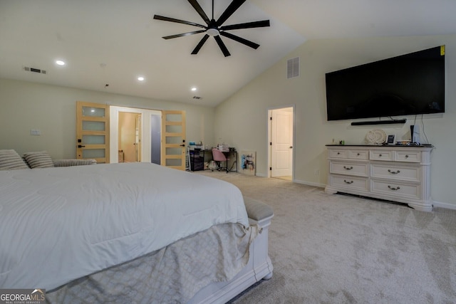 bedroom with visible vents, baseboards, lofted ceiling, and light colored carpet