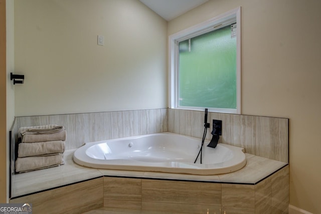 bathroom featuring a garden tub