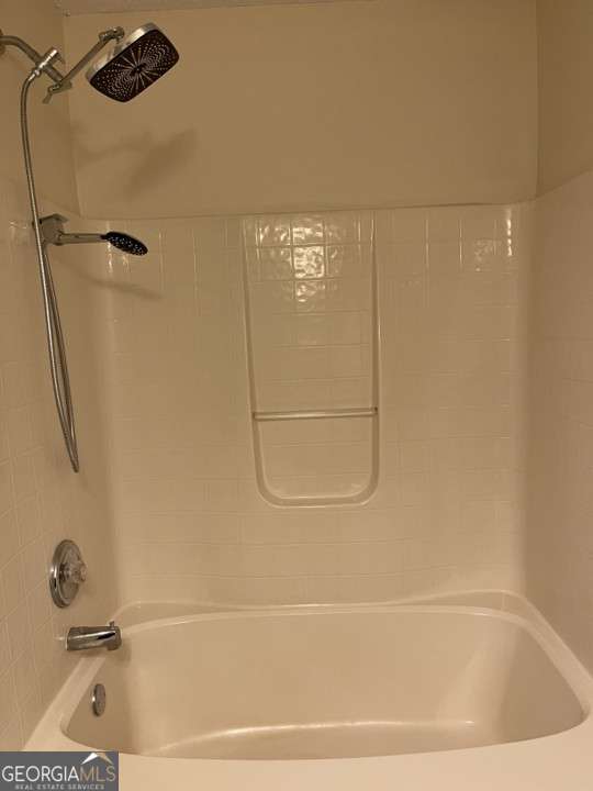 bathroom featuring shower / tub combination