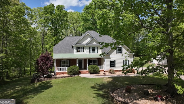 150 Fauna Meadows Dr, Newnan, GA 30263 - view of front of house featuring a porch, a front lawn, and a shingled roof