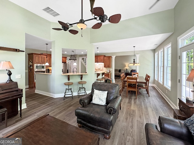 150 Fauna Meadows Dr, Newnan, GA 30263 - living area with a ceiling fan, high vaulted ceiling, and wood finished floors