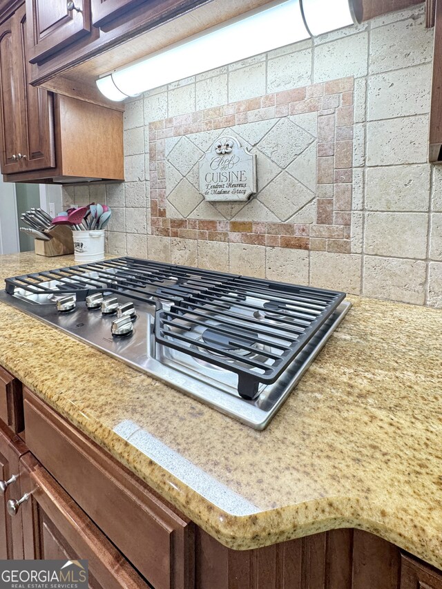 150 Fauna Meadows Dr, Newnan, GA 30263 - kitchen view of stainless steel gas stovetop and decorative backsplash