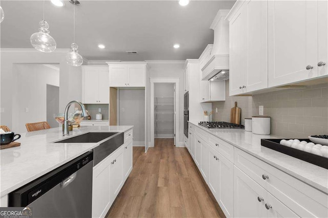 4038 Andover Cir, Mcdonough, GA 30252 - kitchen featuring white cabinetry, custom range hood, tasteful backsplash, and appliances with stainless steel finishes
