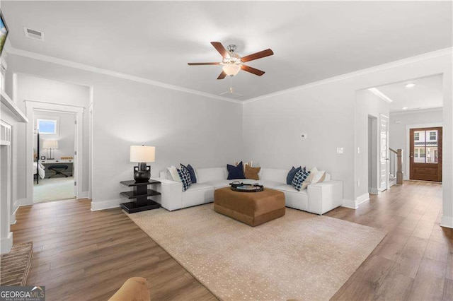 4038 Andover Cir, Mcdonough, GA 30252 - living room featuring visible vents, ceiling fan, wood finished floors, and baseboards