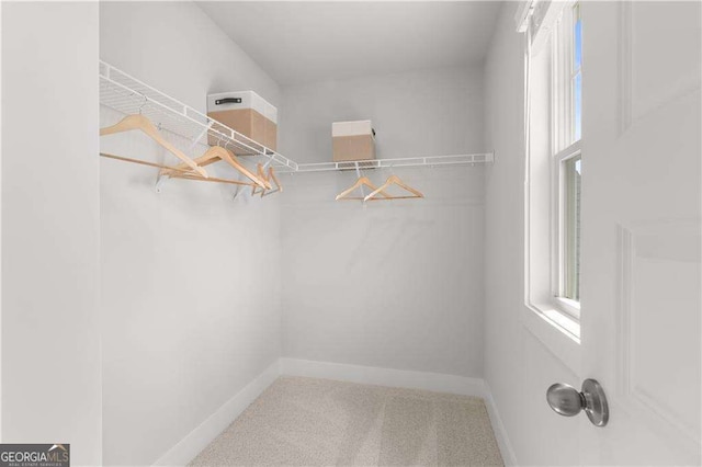 4038 Andover Cir, Mcdonough, GA 30252 - walk in closet featuring carpet flooring