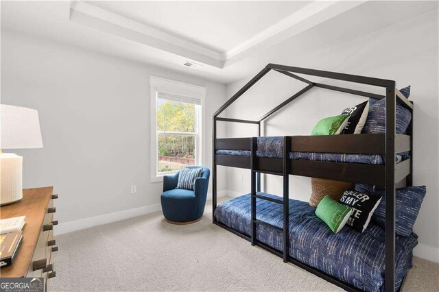 4038 Andover Cir, Mcdonough, GA 30252 - carpeted bedroom featuring visible vents, baseboards, and a raised ceiling