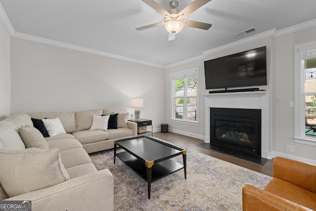 3087 Mountain Shadow Way, Marietta, GA 30064 - living area featuring wood finished floors, visible vents, baseboards, and ornamental molding