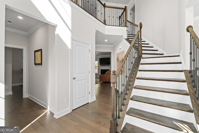 3087 Mountain Shadow Way, Marietta, GA 30064 - stairway with visible vents, wood finished floors, baseboards, and ornamental molding