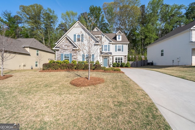 3087 Mountain Shadow Way, Marietta, GA 30064 - traditional-style home with driveway, stone siding, a front yard, and central AC