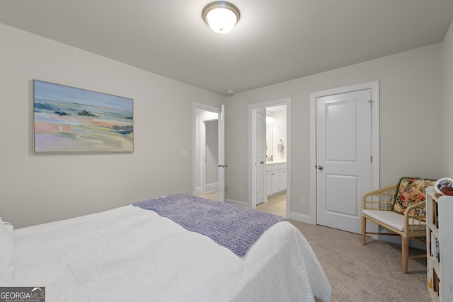 3087 Mountain Shadow Way, Marietta, GA 30064 - bedroom featuring light carpet, baseboards, and connected bathroom