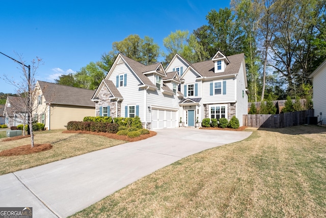 3087 Mountain Shadow Way, Marietta, GA 30064 - traditional home with concrete driveway, a front lawn, stone siding, fence, and cooling unit