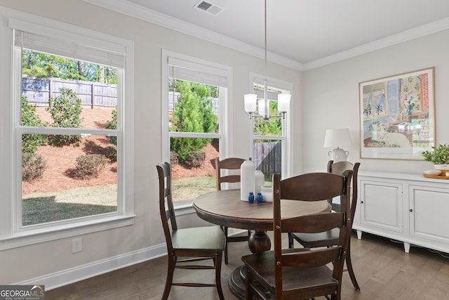 3087 Mountain Shadow Way, Marietta, GA 30064 - dining space with a chandelier, visible vents, crown molding, and dark wood-style floors