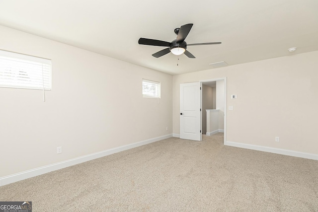 383 Cantrell Dr, Dallas, GA 30157 - spare room with a ceiling fan, light colored carpet, and baseboards