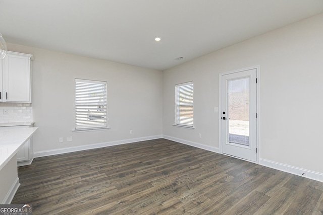 383 Cantrell Dr, Dallas, GA 30157 - unfurnished dining area featuring recessed lighting, dark wood-style floors, and baseboards