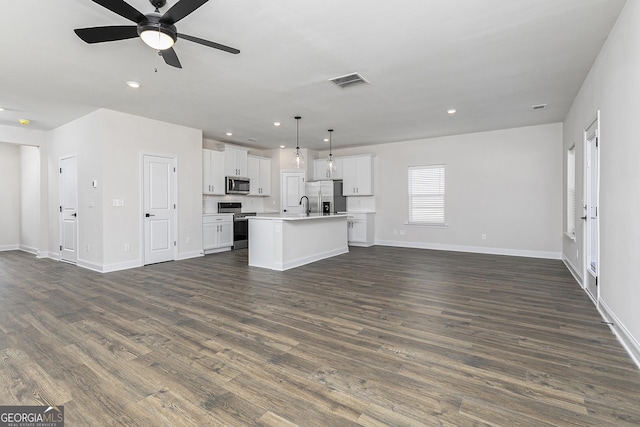 383 Cantrell Dr, Dallas, GA 30157 - unfurnished living room featuring baseboards, visible vents, dark wood-type flooring, and recessed lighting