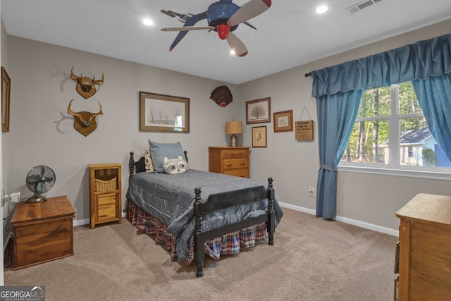 bedroom featuring carpet floors, baseboards, visible vents, and recessed lighting