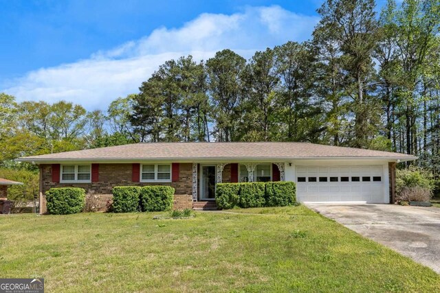 4164 Weston Dr, Powder Springs, GA 30127 - ranch-style home with a garage, driveway, a front lawn, and brick siding