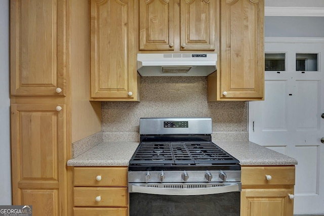 4164 Weston Dr, Powder Springs, GA 30127 - kitchen featuring gas range, under cabinet range hood, light countertops, crown molding, and light brown cabinetry