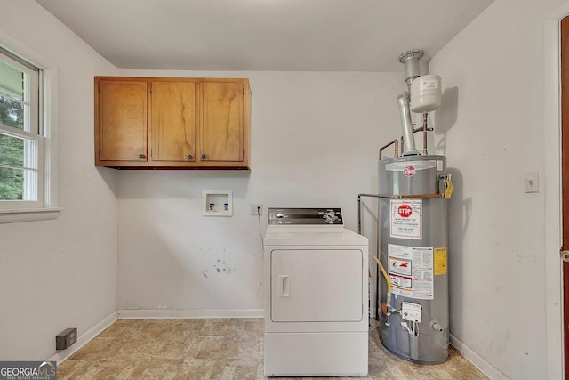 4164 Weston Dr, Powder Springs, GA 30127 - laundry room featuring washer / dryer, water heater, cabinet space, and baseboards
