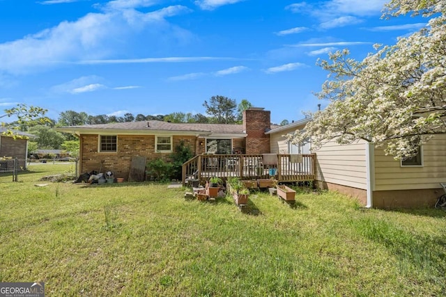 4164 Weston Dr, Powder Springs, GA 30127 - back of house with a deck, a chimney, and brick siding
