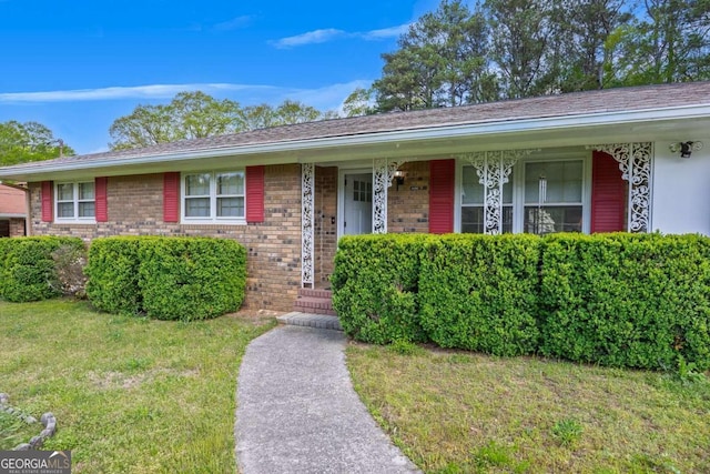 4164 Weston Dr, Powder Springs, GA 30127 - single story home with a front yard, brick siding, and covered porch