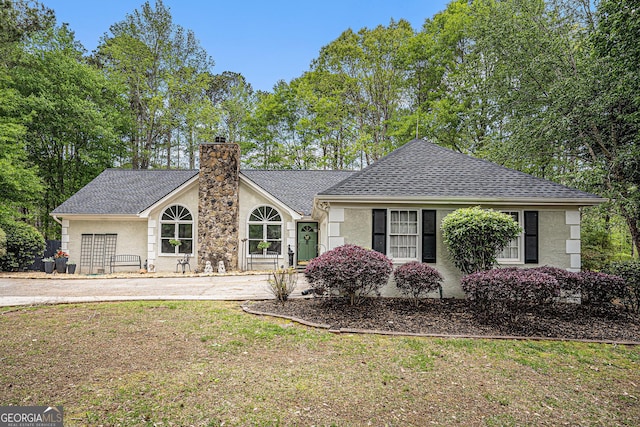 110 Emerald Dr, Mcdonough, GA 30253 - single story home with a front yard, stucco siding, a chimney, and a shingled roof