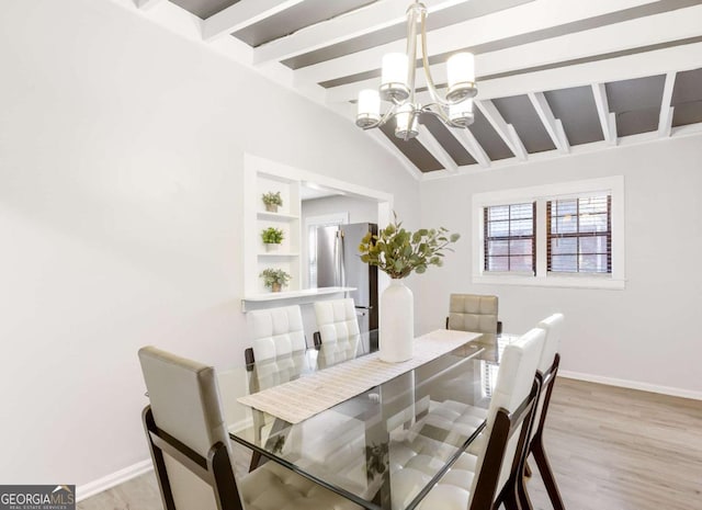 1340 Hawthorne Ave SE, Smyrna, GA 30080 - dining area featuring light wood-style floors, an inviting chandelier, baseboards, and vaulted ceiling with beams