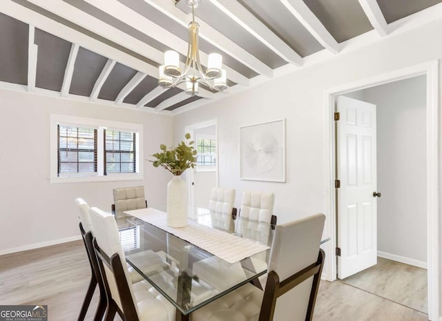 1340 Hawthorne Ave SE, Smyrna, GA 30080 - dining area with light wood finished floors, beamed ceiling, an inviting chandelier, and baseboards