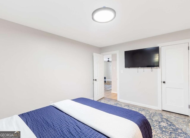 1340 Hawthorne Ave SE, Smyrna, GA 30080 - bedroom with baseboards and wood finished floors