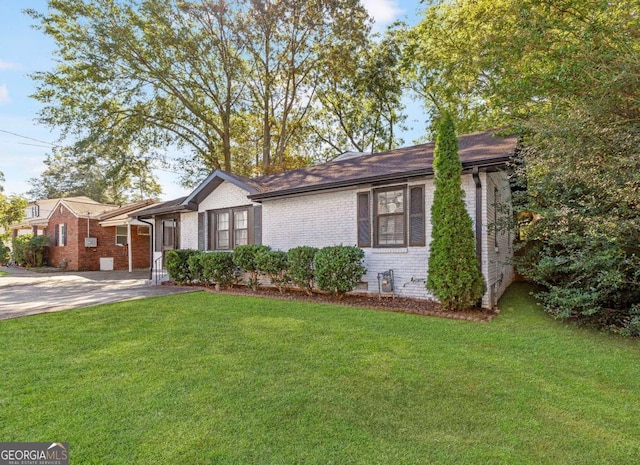1340 Hawthorne Ave SE, Smyrna, GA 30080 - ranch-style house featuring brick siding and a front yard