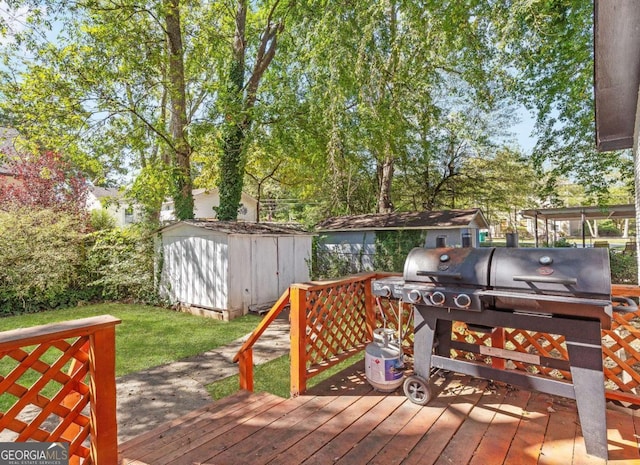1340 Hawthorne Ave SE, Smyrna, GA 30080 - wooden deck featuring a storage shed and an outbuilding