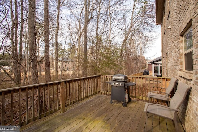 deck featuring grilling area