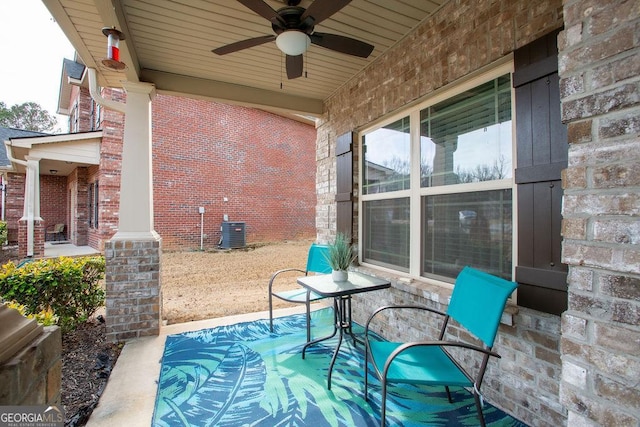 view of patio / terrace with a ceiling fan, central AC, and a porch
