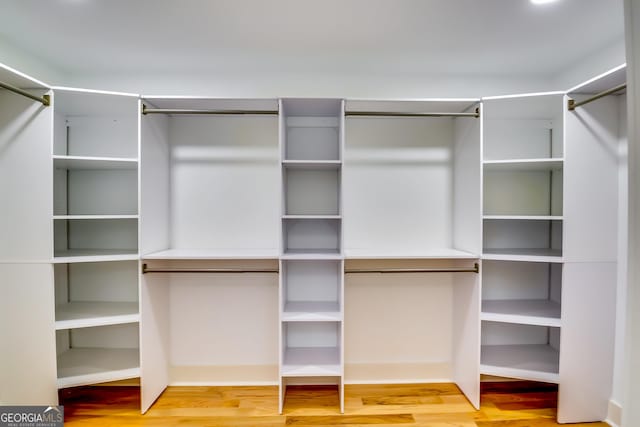 3244 Mount Olive Rd, Atlanta, GA 30344 - walk in closet with wood finished floors