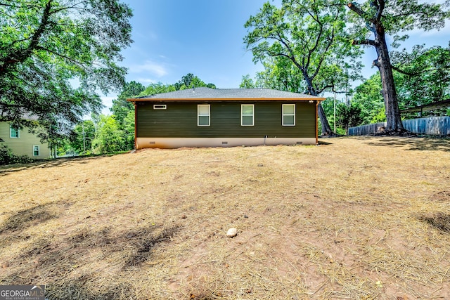 3244 Mount Olive Rd, Atlanta, GA 30344 - rear view of house featuring crawl space and fence