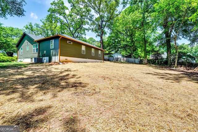 3244 Mount Olive Rd, Atlanta, GA 30344 - view of yard with fence and central AC