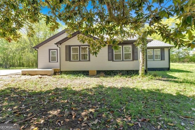 exterior space with a lawn