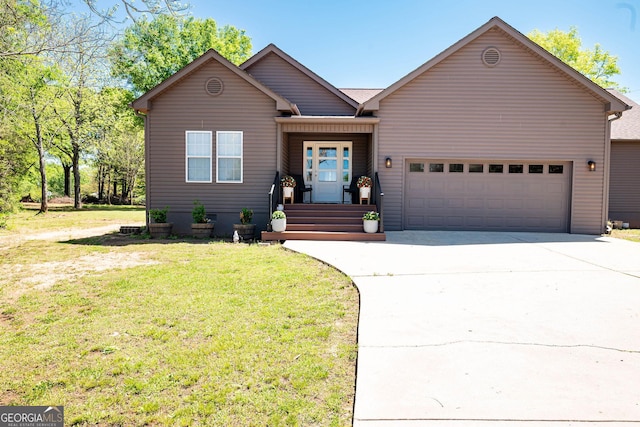 2189 Broad St, Statham, GA 30666 - single story home with driveway, a garage, and a front lawn