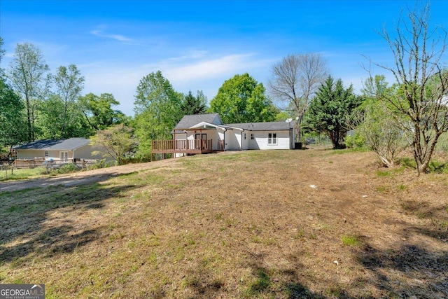 view of yard with a deck