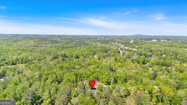 aerial view with a wooded view
