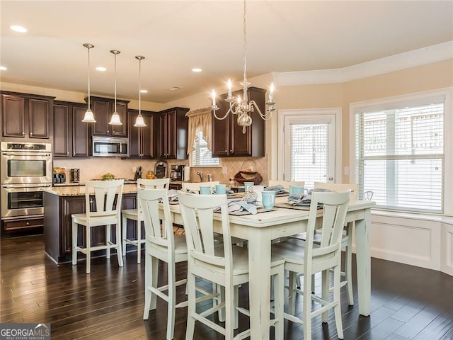 dining space with crown molding, recessed lighting, a chandelier, and dark wood-type flooring