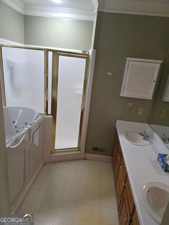 bathroom featuring a shower stall, crown molding, a sink, and visible vents