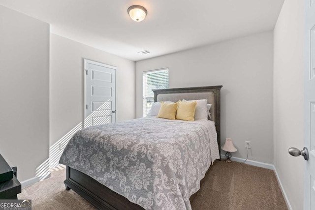 6424 Barker Station Walk, Sugar Hill, GA 30518 - carpeted bedroom with baseboards