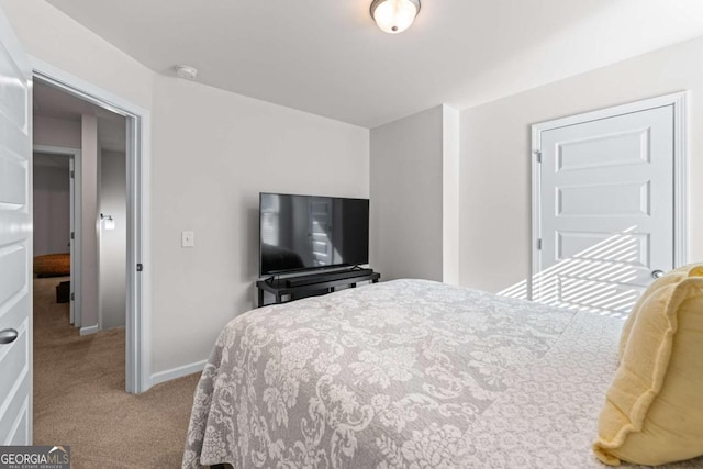 6424 Barker Station Walk, Sugar Hill, GA 30518 - carpeted bedroom featuring baseboards