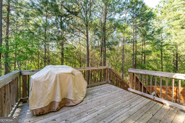 6424 Barker Station Walk, Sugar Hill, GA 30518 - wooden terrace with grilling area and a view of trees